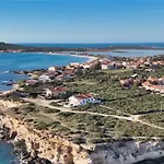 Laura - Casa de Férias Putzu Idu