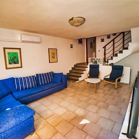 Laura - Casa de Férias Putzu Idu